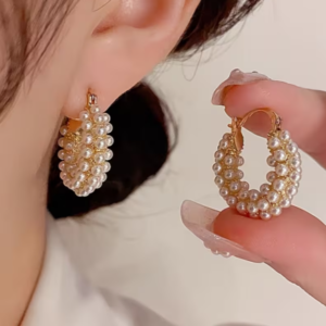 Un par de Aretes Argollas Perlas Dorados